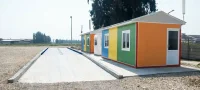 Container and Modular Buildings made by Wall Cladding and Roofing Panels